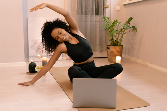 Lady stretching before bed - Best stretches for sleep